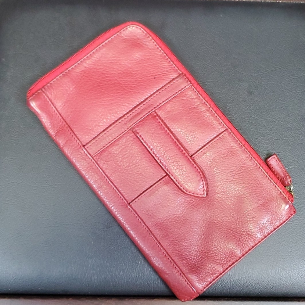 J.P. Ourse & CIE red leather passport case. A4